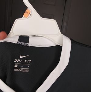 A Grey Dri fit Nike Mediam. Very sexy for your ext